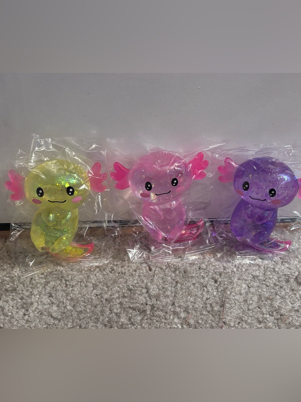 Sugar Swaps Glitter Axolotl Squishy bundle of 3 Pink, Yellow & Purple